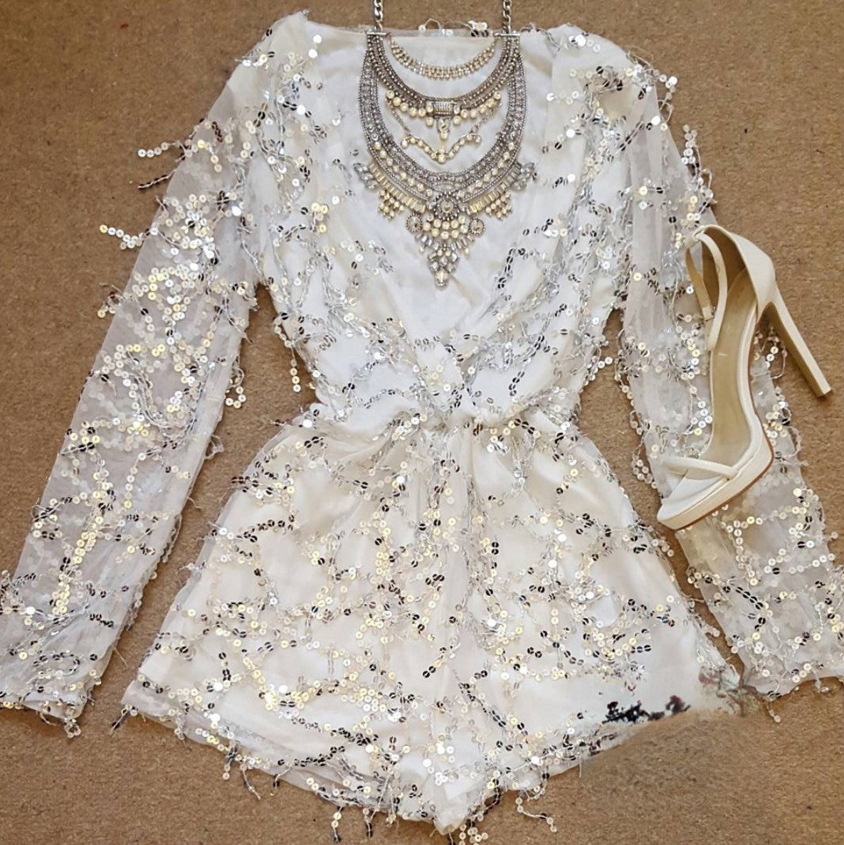 Sparkling long-sleeve onesie