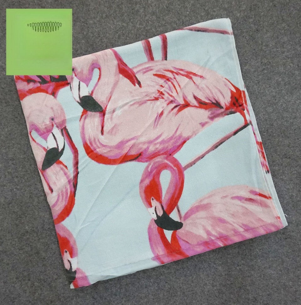 Telo mare flamingo beach ripiegato, fenicotteri su fondo azzurro | Dream Shop