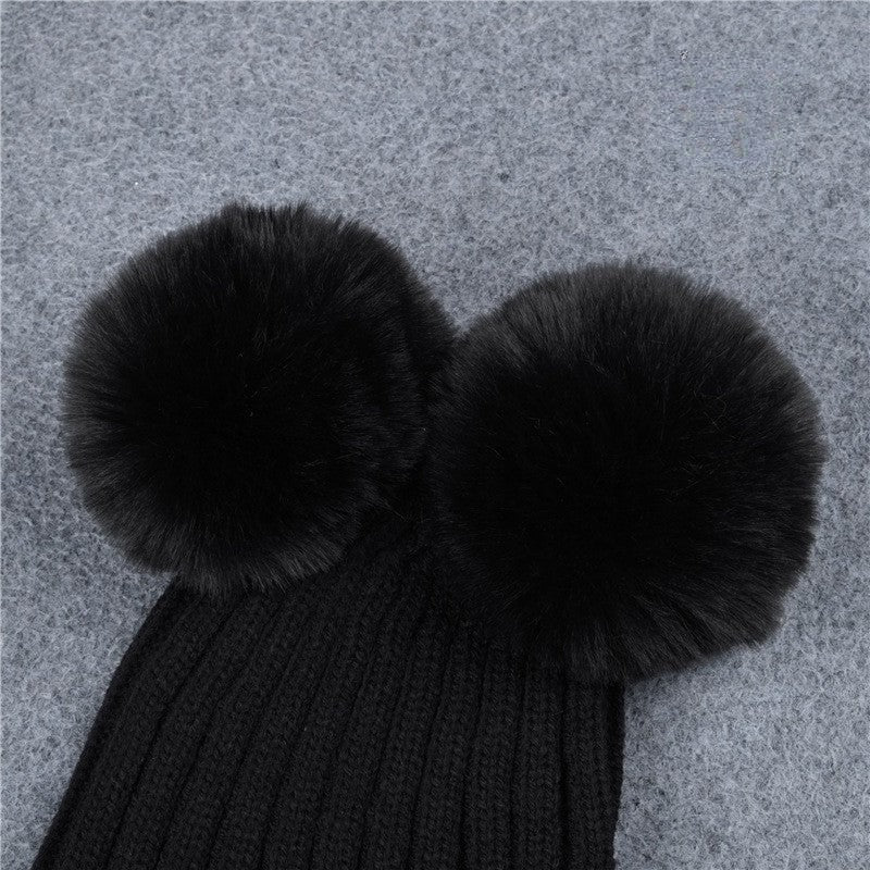 Cappellino double pon-pon in movimento | Dream Shop