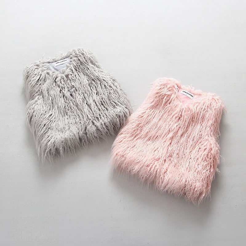 Smanicato pelliccia bimba Saira rosa indossato — Dream Shop
