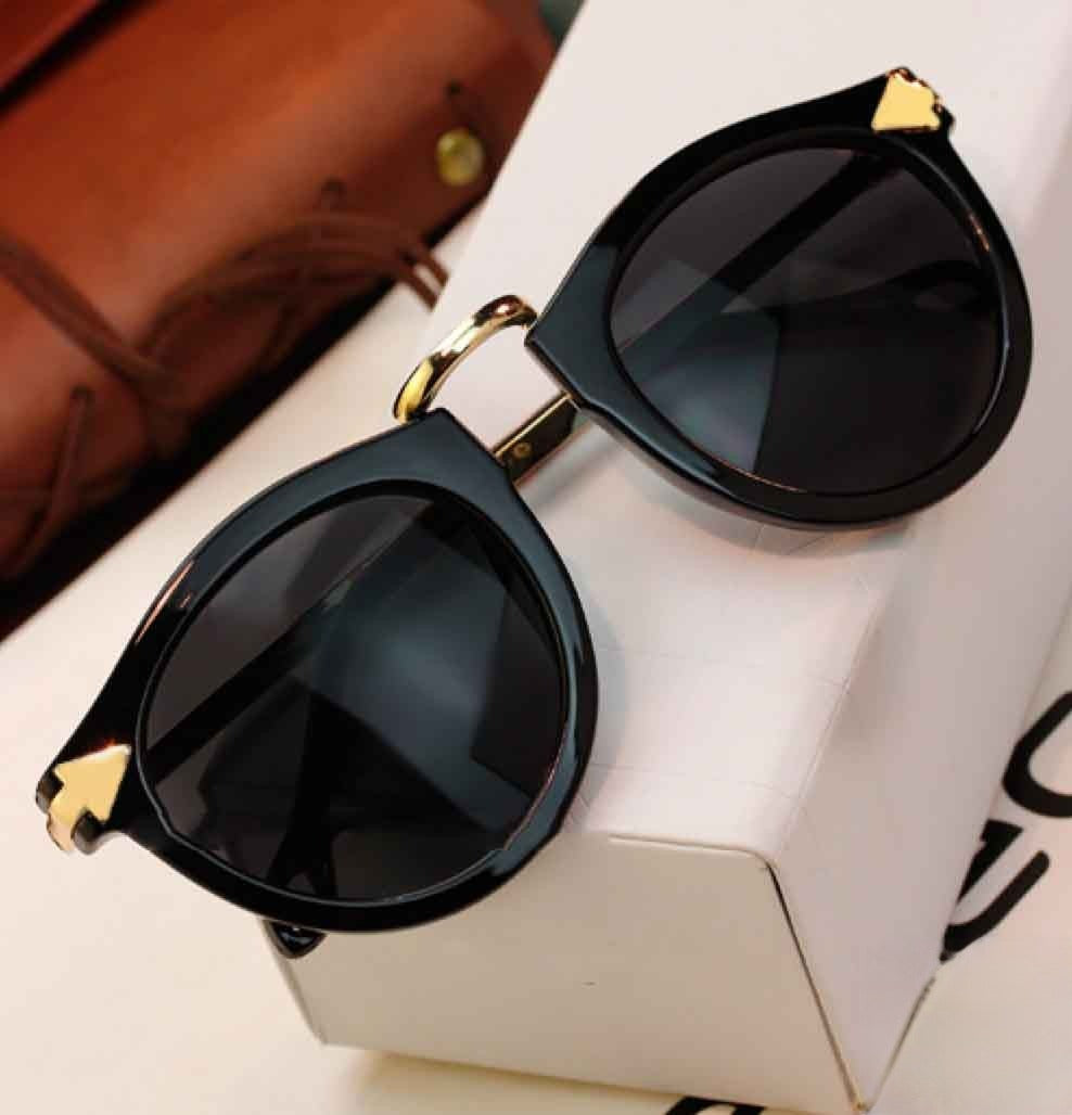 Moloko Sunglasses in acrilico nero con finiture in metallo — Dream Shop