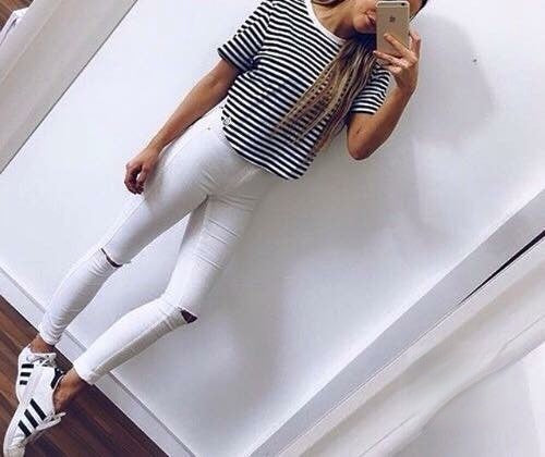Skinny jeans with white straps