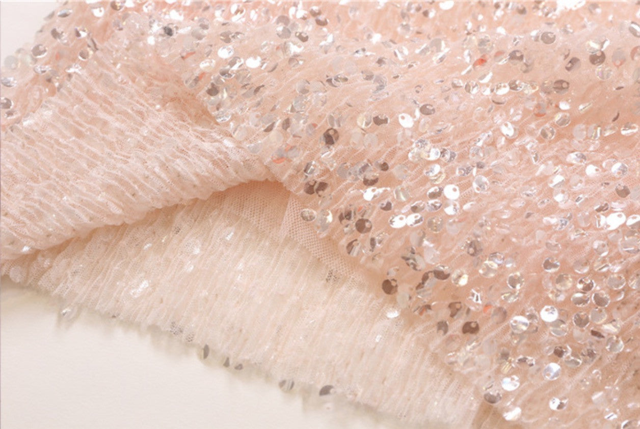 Tee in pailettes tonde