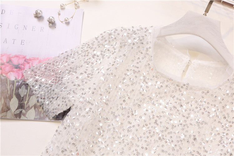 Tee in pailettes tonde