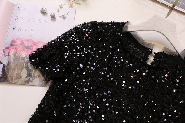 Tee in pailettes tonde