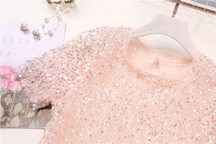 Tee in pailettes tonde