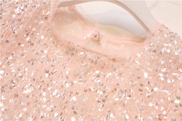 Tee in pailettes tonde