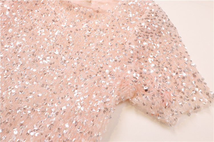 Tee in pailettes tonde