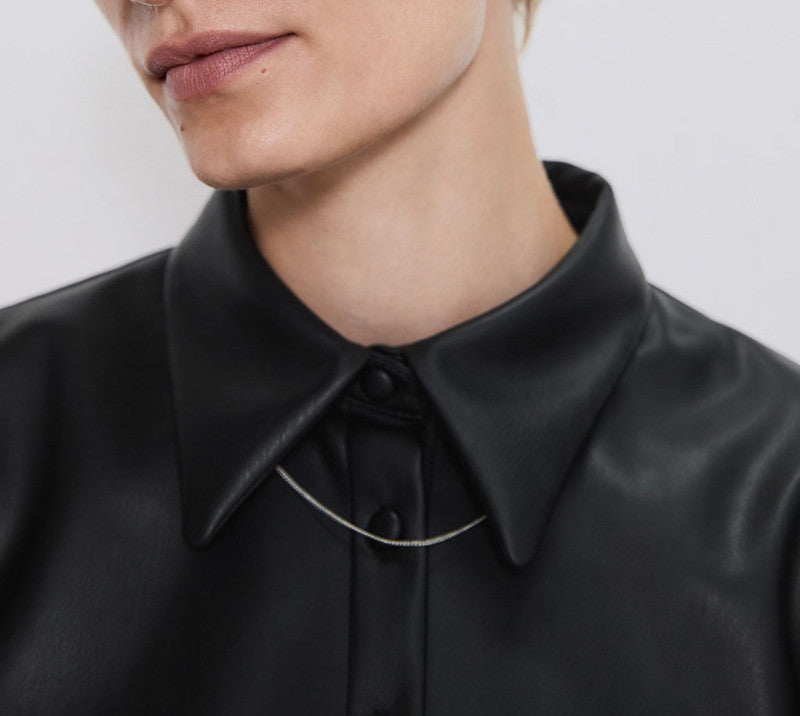 Camicia ecopelle maniche a sbuffo