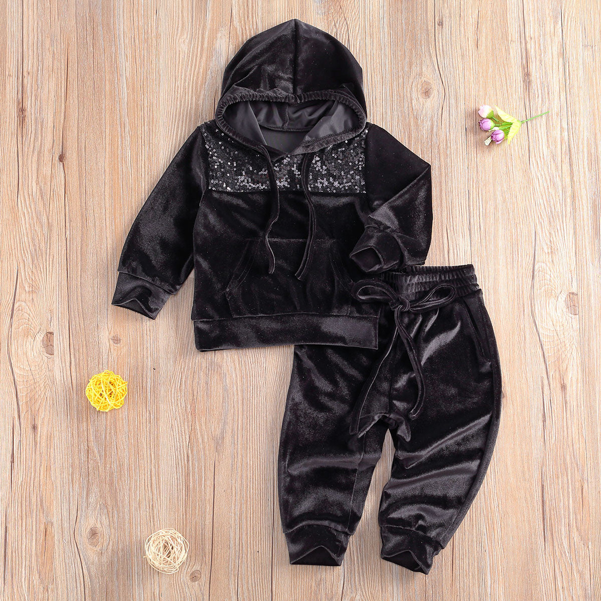 Tuta baby con pailettes