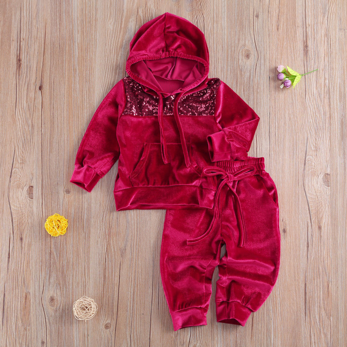 Tuta baby con pailettes