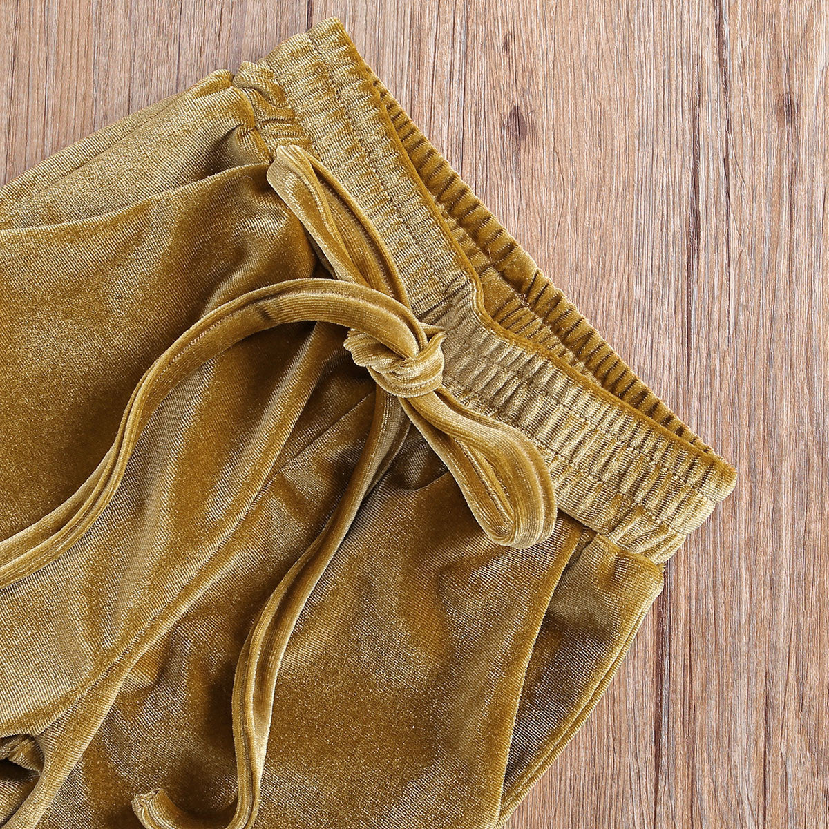 Tuta baby con pailettes