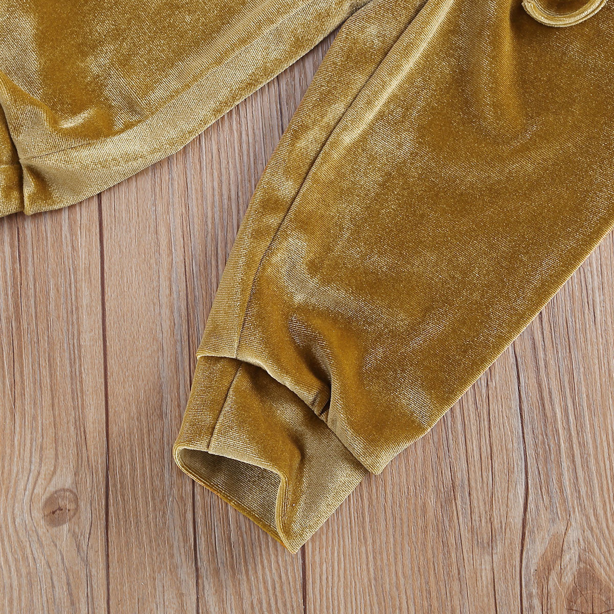 Tuta baby con pailettes