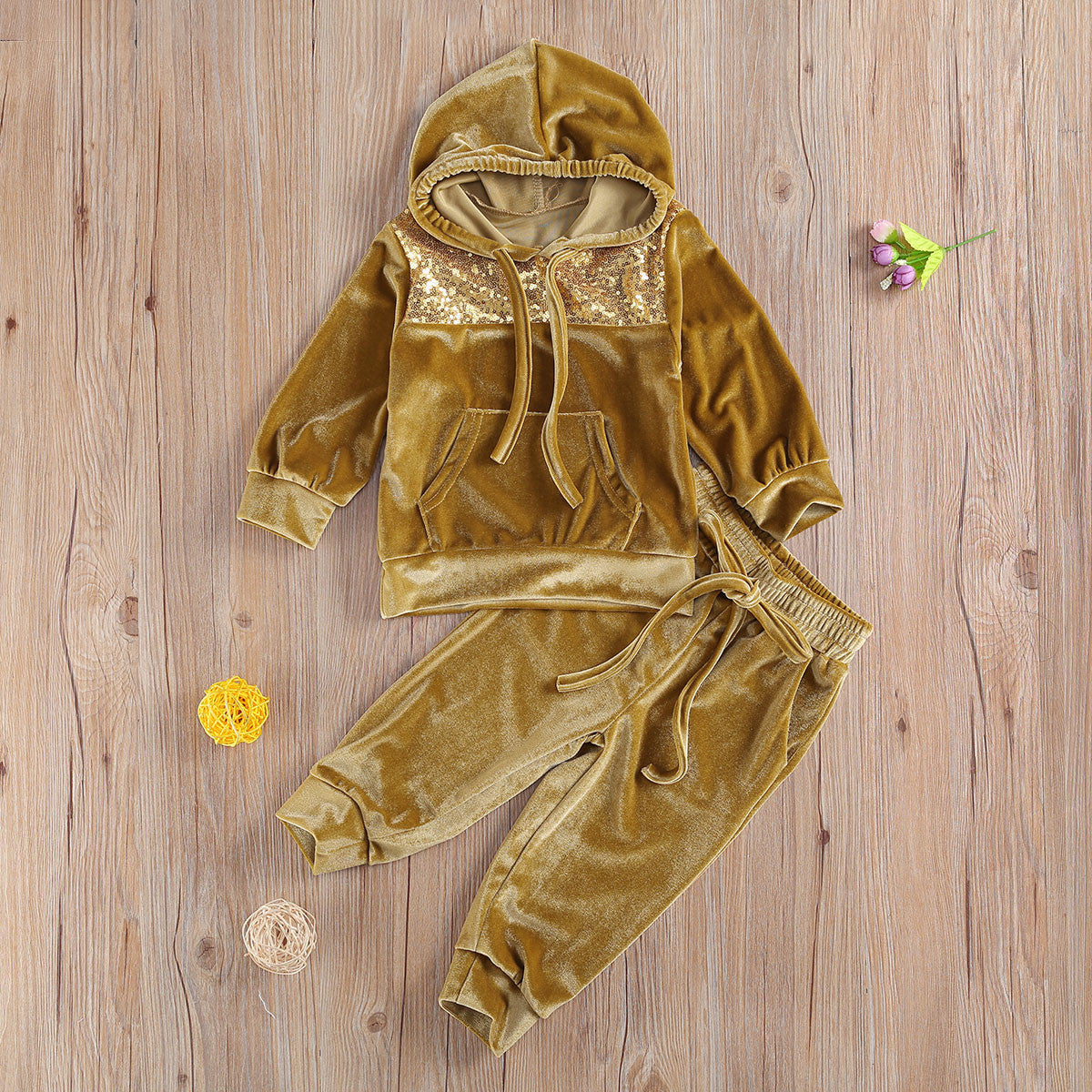 Tuta baby con pailettes