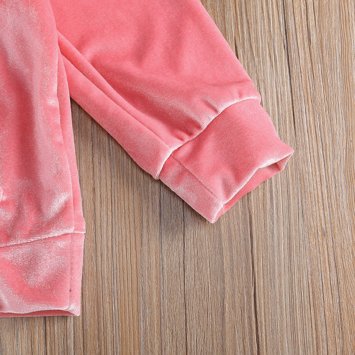 Tuta baby con pailettes