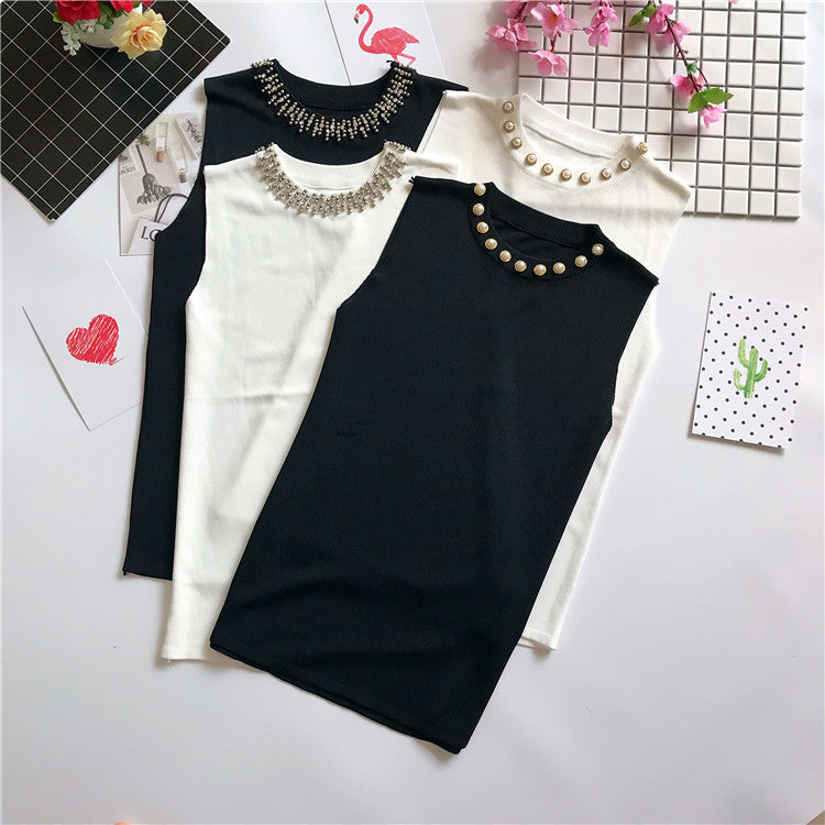 Maglioncini smanicati collier