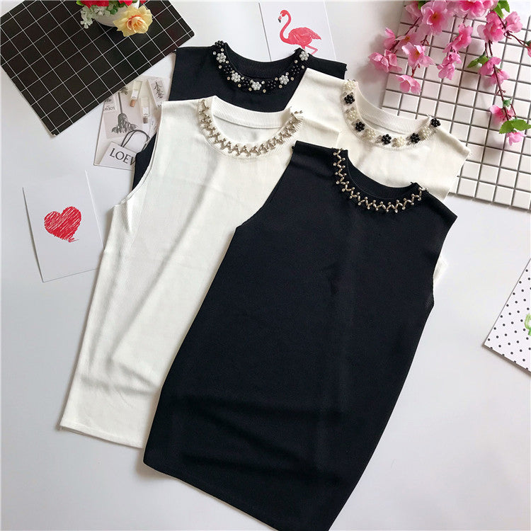 Maglioncini smanicati collier