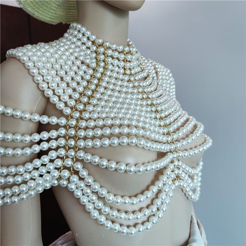 Top-scultura in perle Nyhg