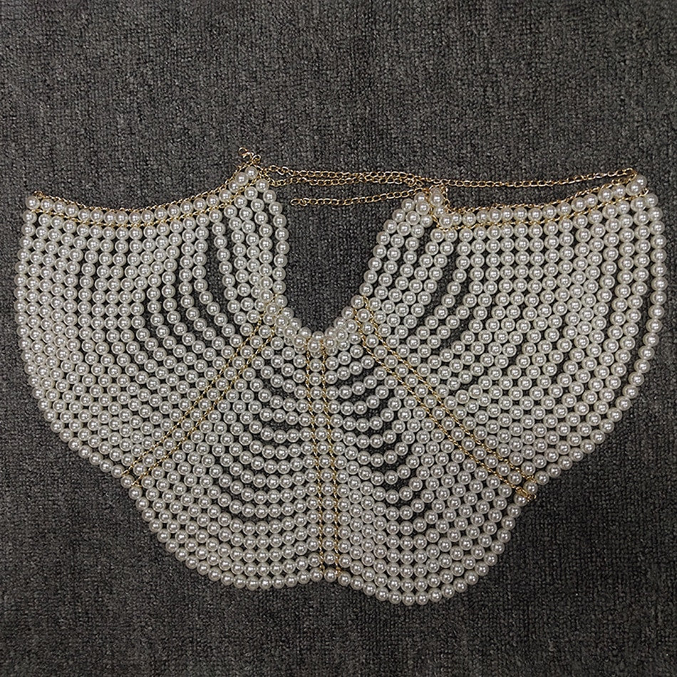 Top-scultura in perle Nyhg