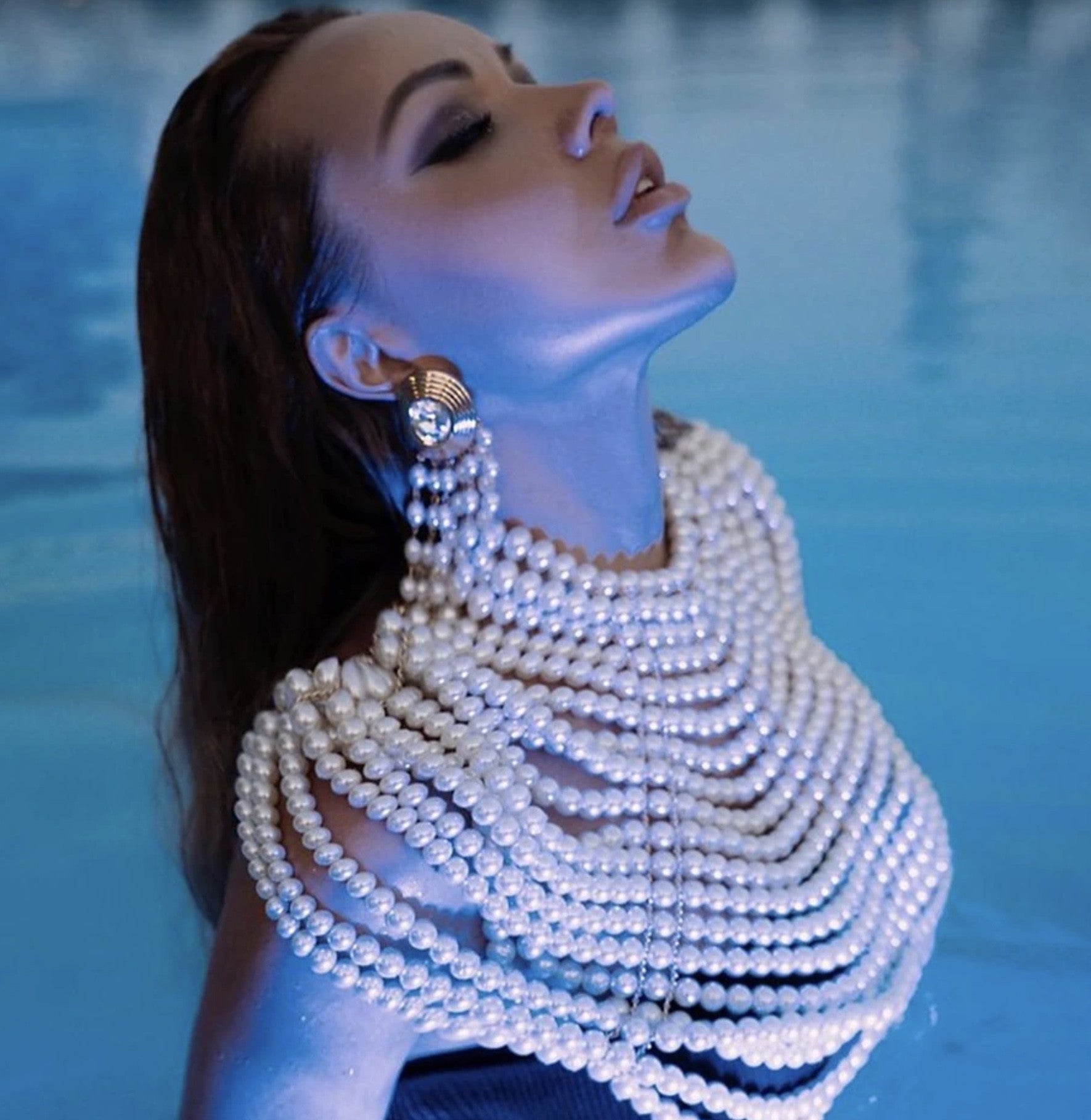 Top-scultura in perle Nyhg