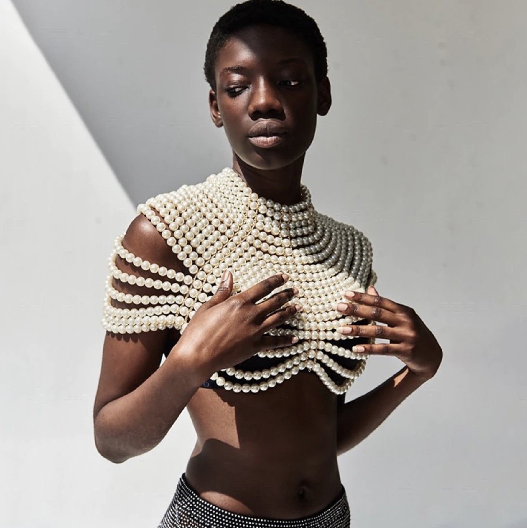 Top-scultura in perle Nyhg