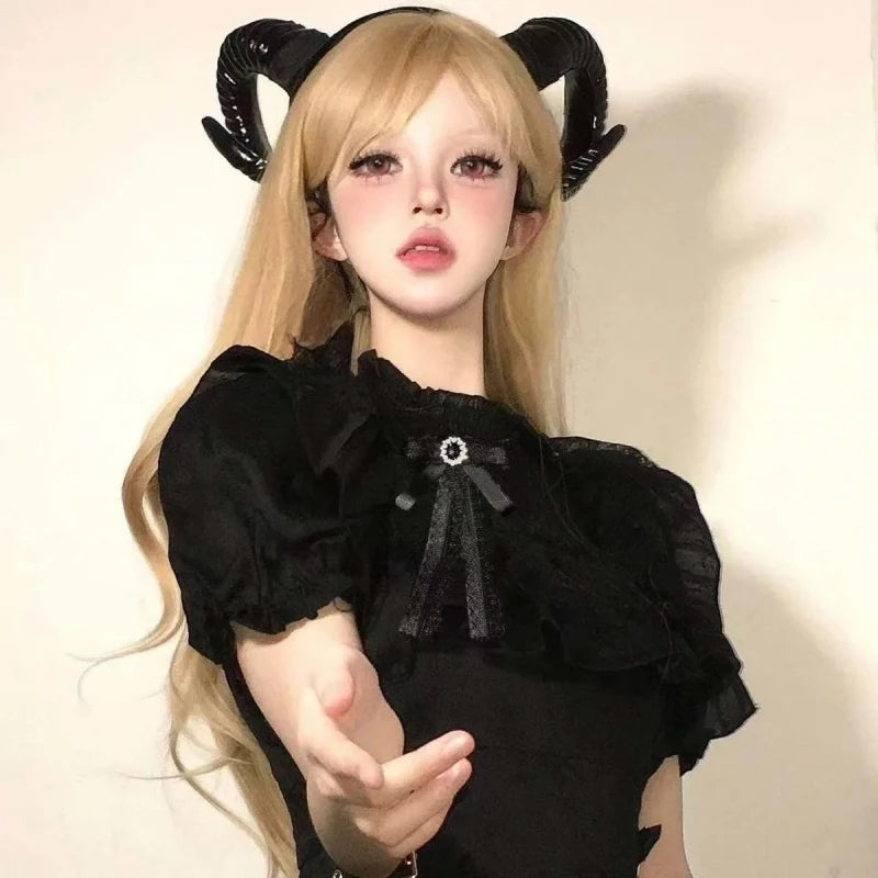 Cerchietto corna da demone
Accessorio costume strega regina