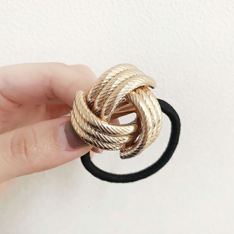 Copri-coda elastico metal