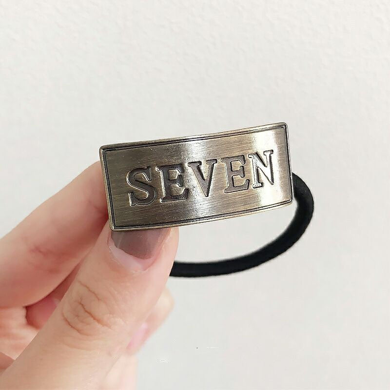 Copri-coda elastico metal