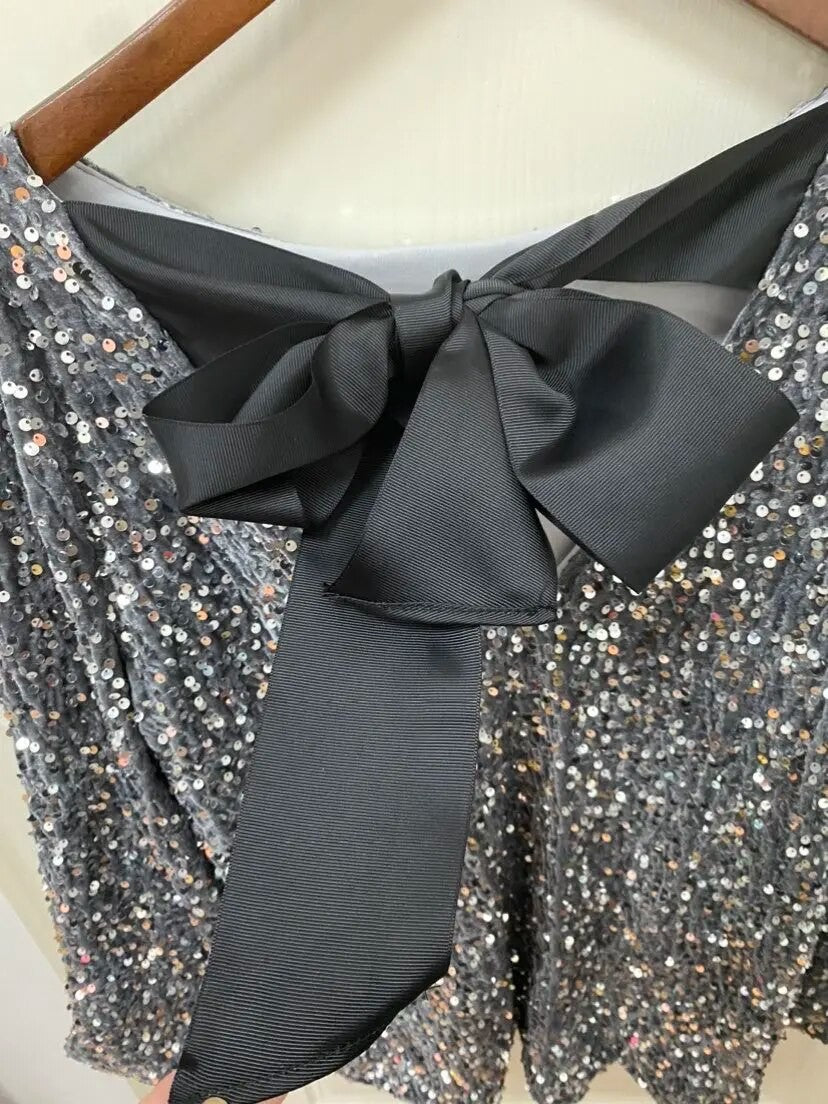 Holiday bow sequindress