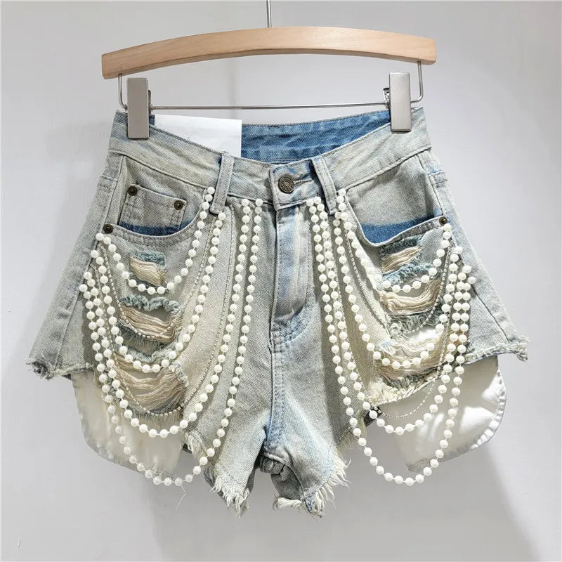 Shorts jeans con catene di perle Pearl Unchain stile western chic