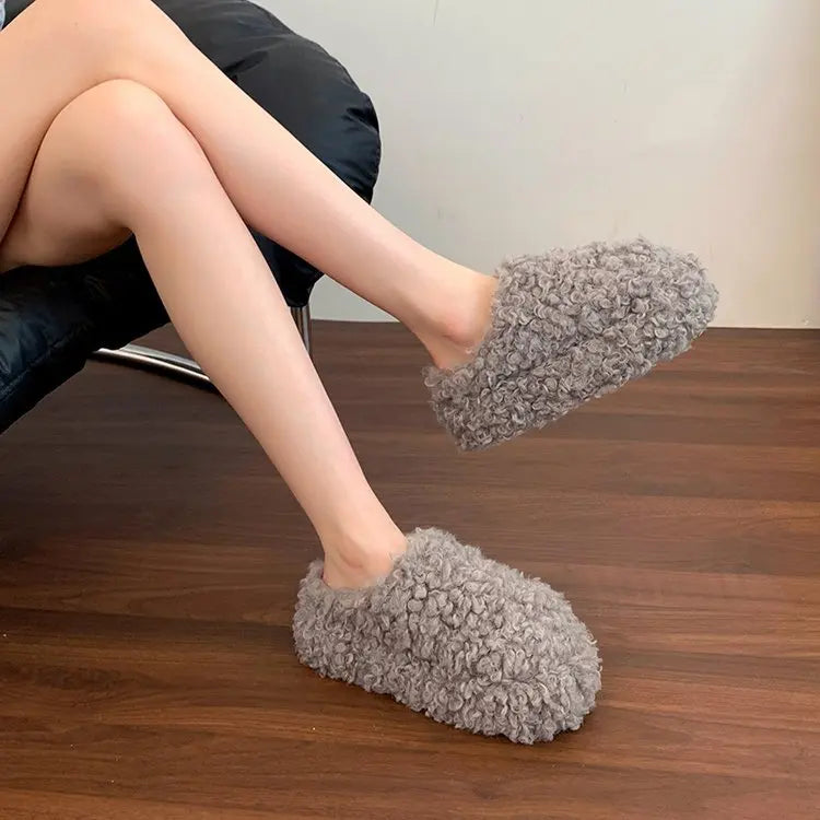 Pantofole in eco pelliccia riccia effetto Mongolia