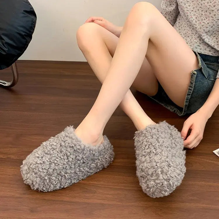 Pantofole in eco pelliccia riccia effetto Mongolia