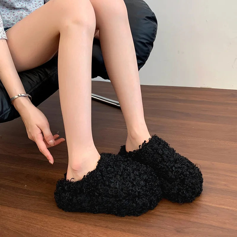 Pantofole in eco pelliccia riccia effetto Mongolia