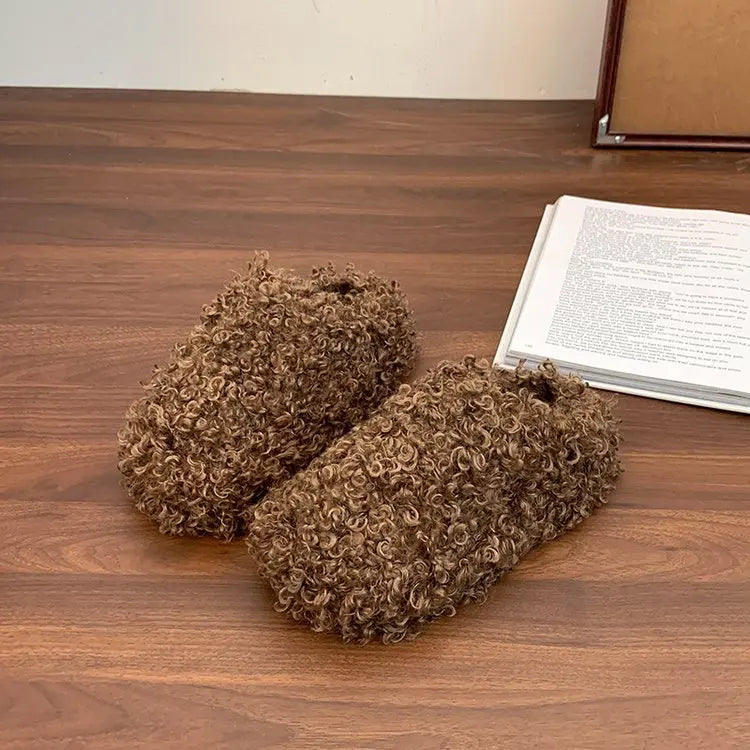 Pantofole in eco pelliccia riccia effetto Mongolia