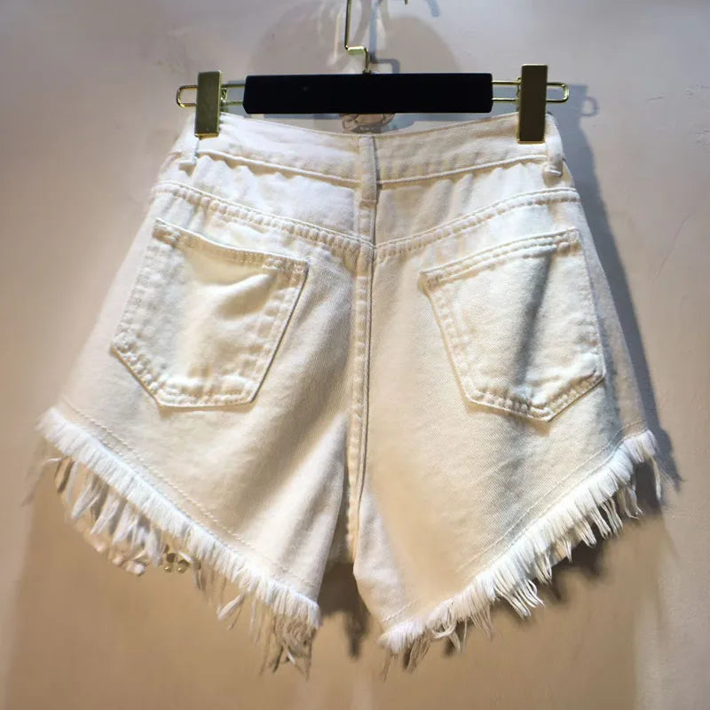 Shorts jeans con catene di perle Pearl Unchain stile western chic