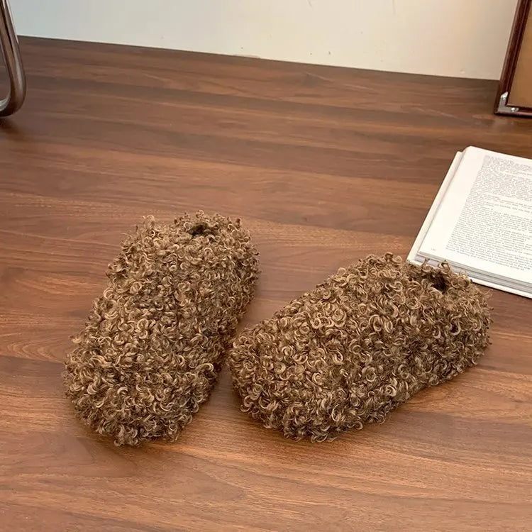 Pantofole in eco pelliccia riccia effetto Mongolia