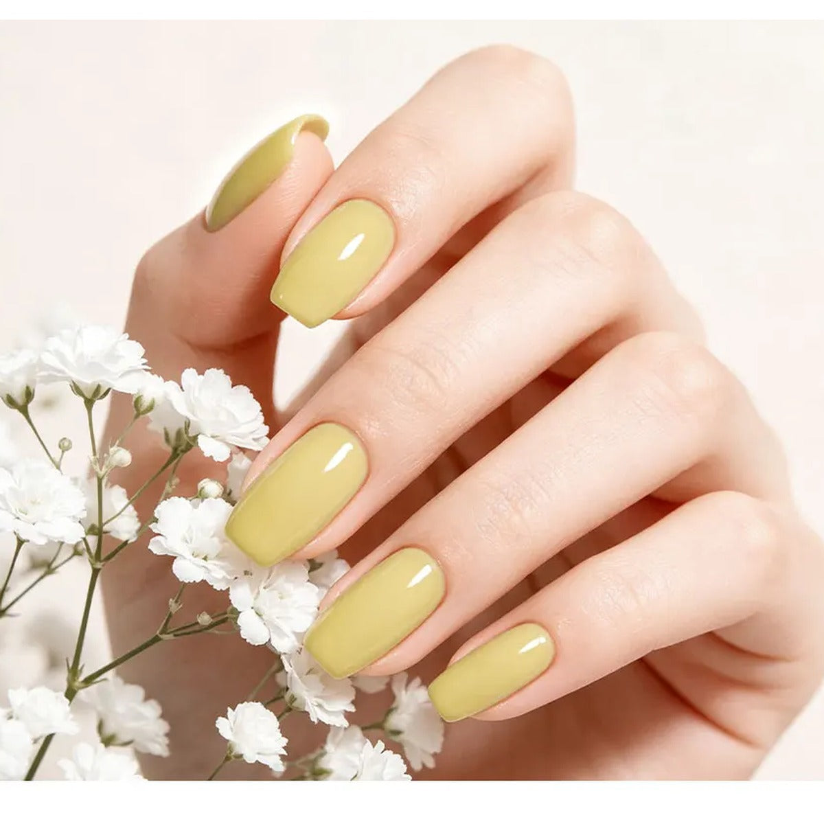 Gel nail polish pen in pastel yellow on short natural nails | Dream Shop