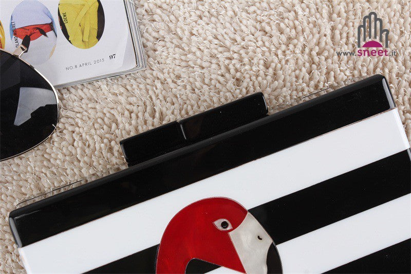 bolso de mano con rayas de flamenco