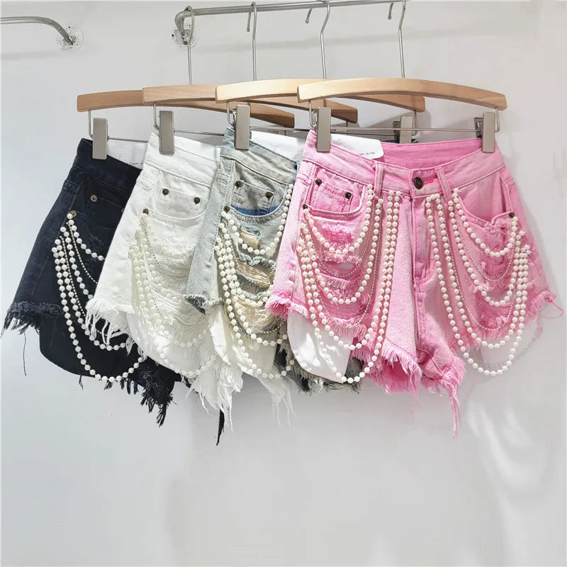 Shorts jeans con catene di perle Pearl Unchain stile western chic