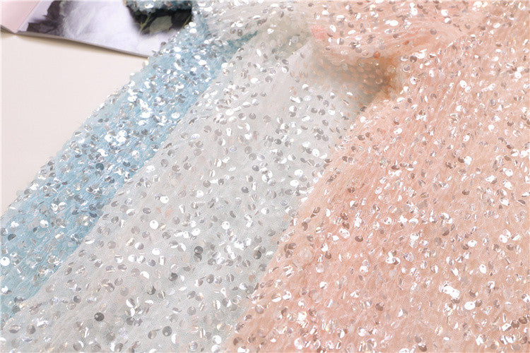 Tee in pailettes tonde