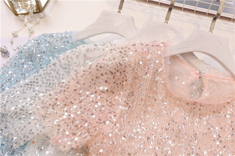 Tee in pailettes tonde