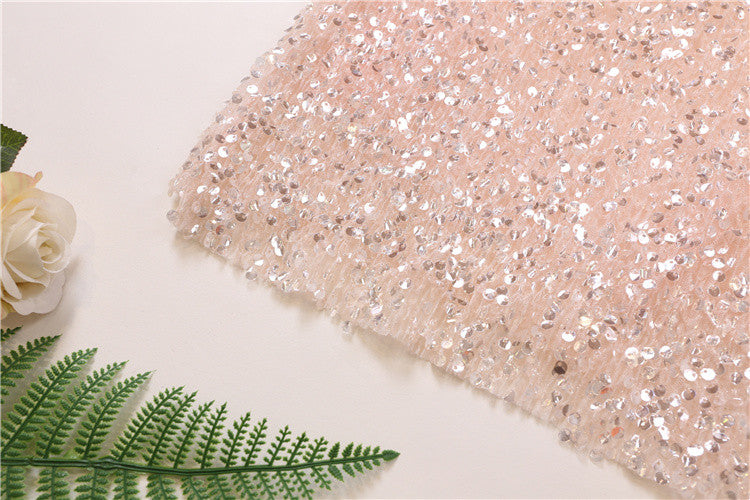 Tee in pailettes tonde