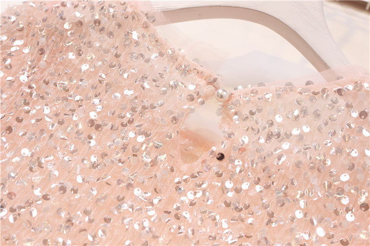 Tee in pailettes tonde