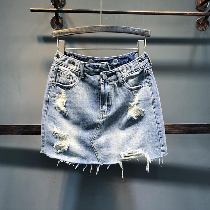 Minigonna denim con occhielli