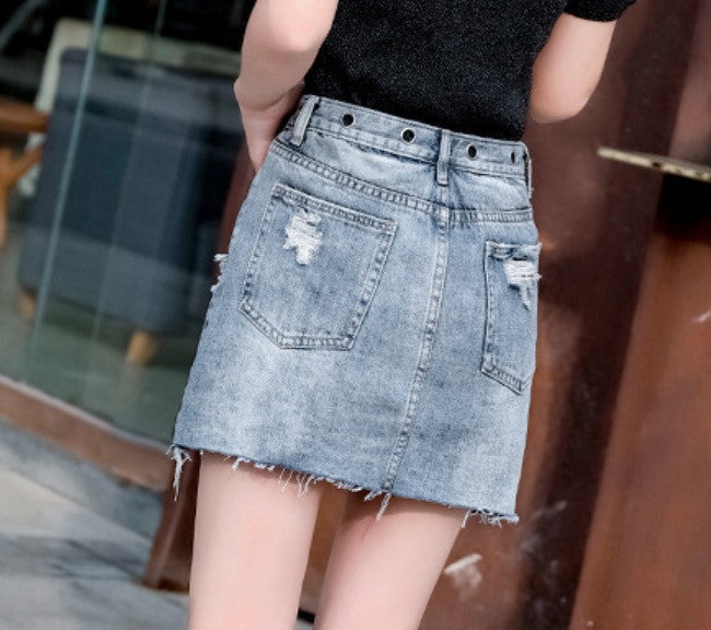 Minigonna denim con occhielli
