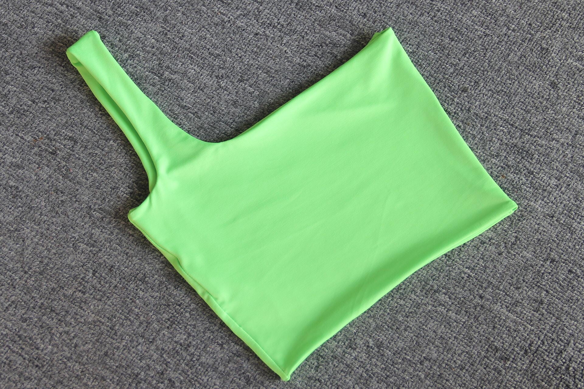 Top corto monospalla