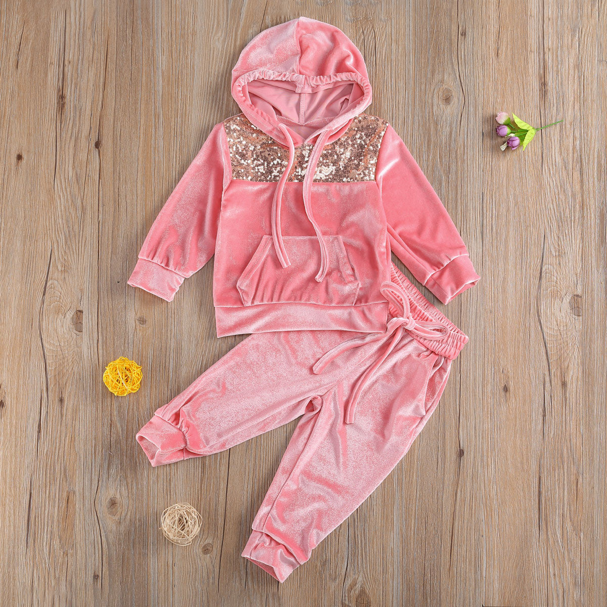 Tuta baby con pailettes