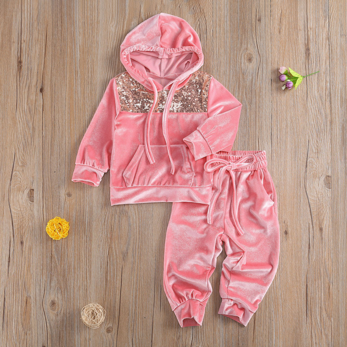 Tuta baby con pailettes