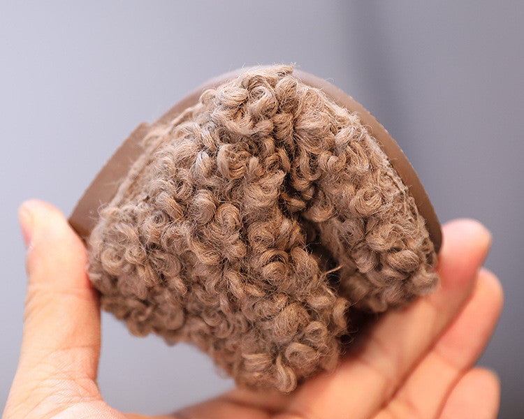 Scarponcini baby in lana riccia d'agnello