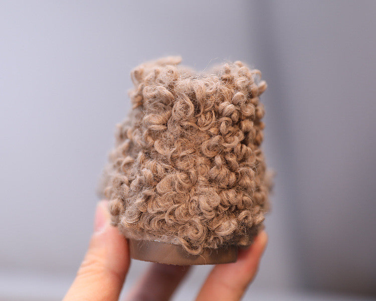 Scarponcini baby in lana riccia d'agnello